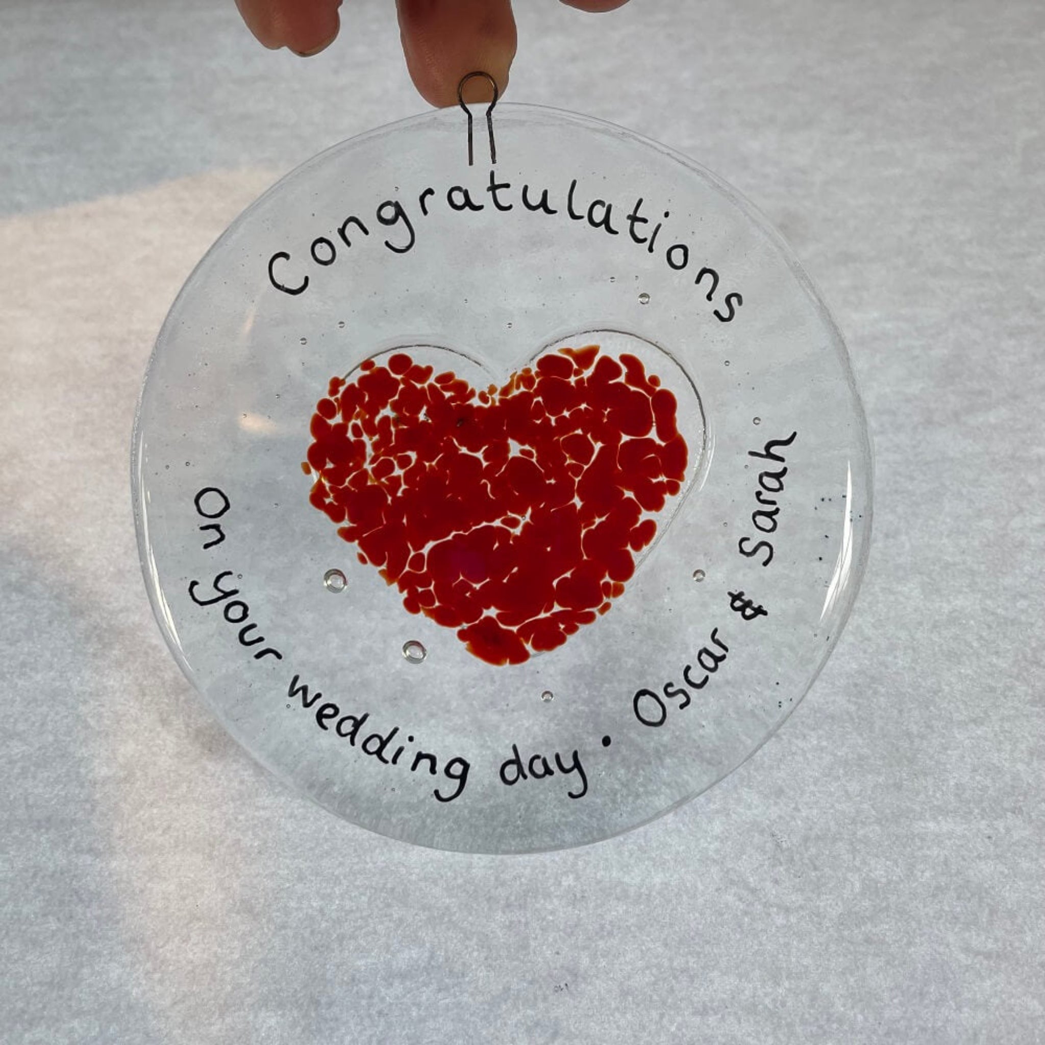 personalised hand painted fused glass clear glass circle, with heart shape, hanging decoration / sun catcher, special birthdays, celebrations, with personalised happy anniversary message.